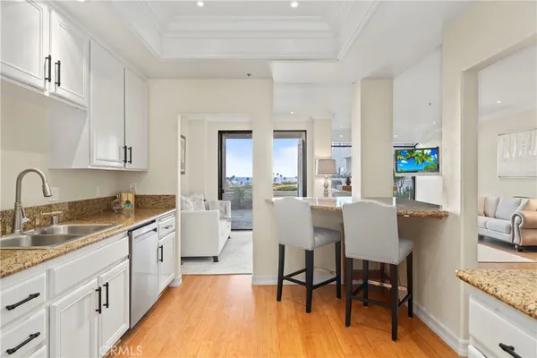 $1,725,000 | 200 Paris Lane, Unit 111, Newport Beach, CA 92663