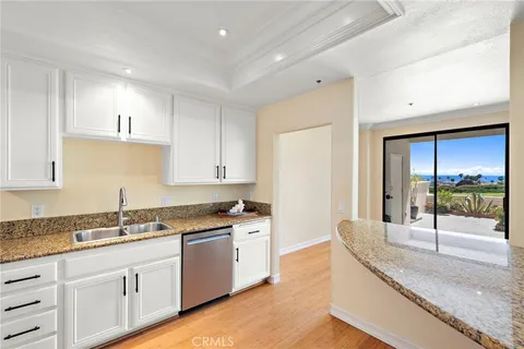$1,725,000 | 200 Paris Lane, Unit 111, Newport Beach, CA 92663