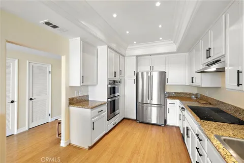 $1,725,000 | 200 Paris Lane, Unit 111, Newport Beach, CA 92663