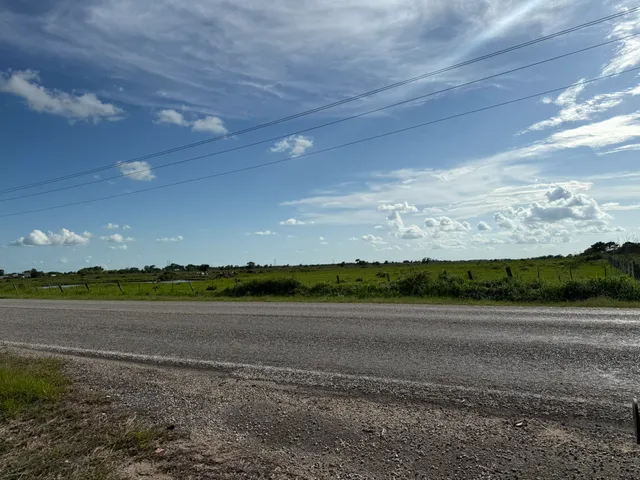 a view of a lake with a big yard
