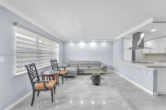 a outdoor space with a couch and chairs