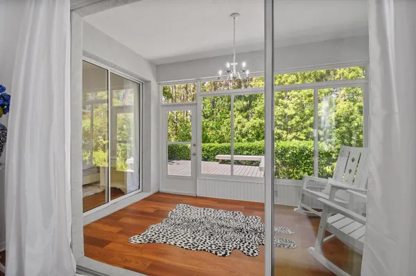 a living room with large windows