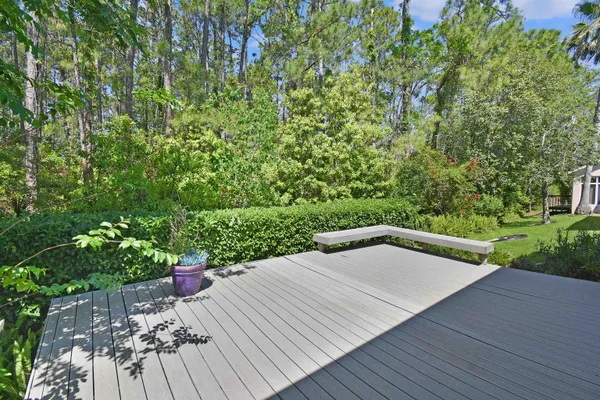 a view of a backyard with sitting area