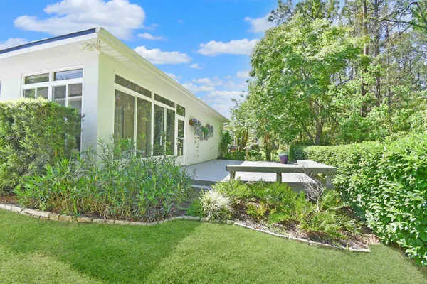 a view of a back yard of the house