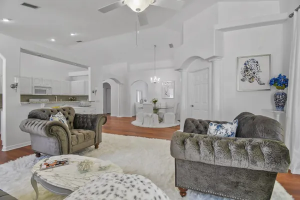 a living room with furniture and a couch