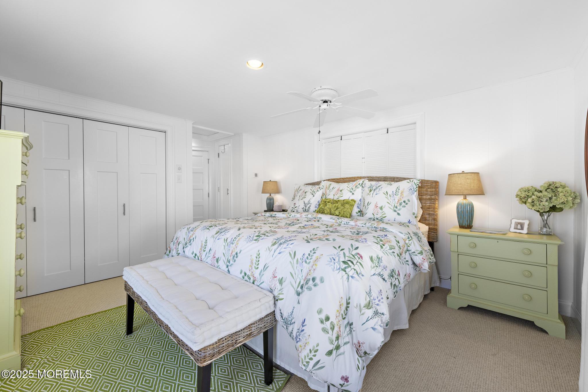 9 Inlet Road Beach Haven, NJ 08008 - Photo 17 of 51 a bedroom with a bed and a dresser in it