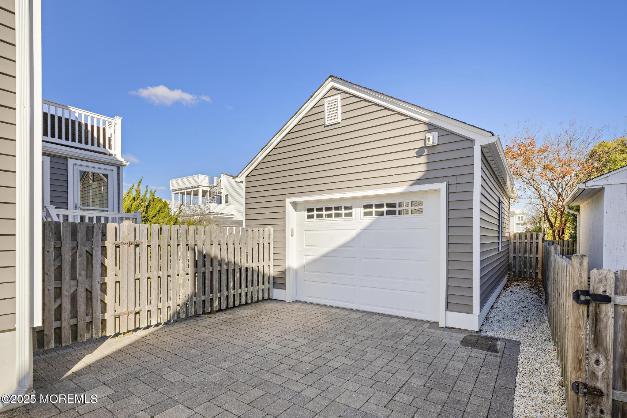 9 Inlet Road Beach Haven, NJ 08008 - Photo 30 of 51 a view of a house with iron stairs