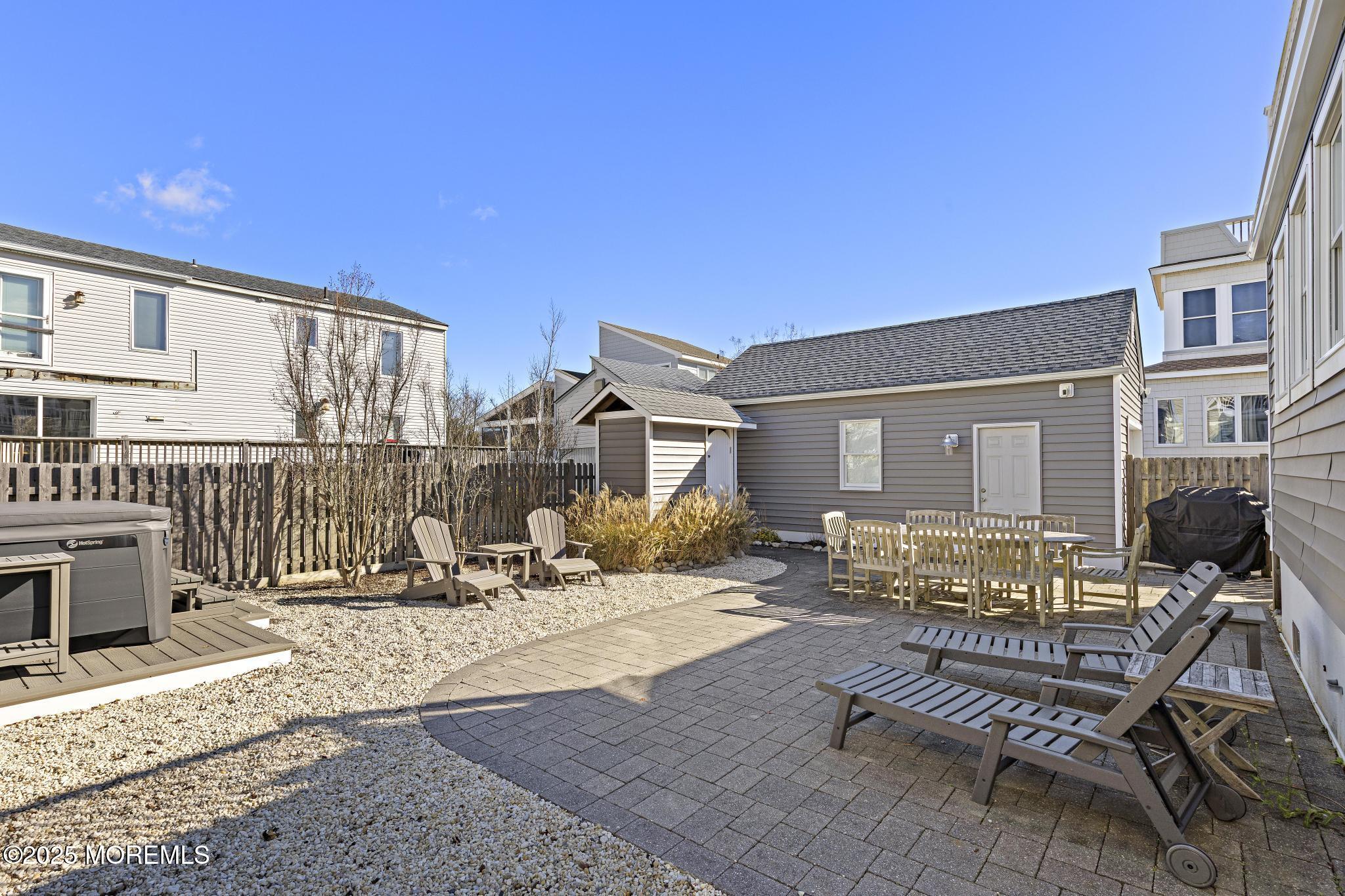9 Inlet Road Beach Haven, NJ 08008 - Photo 31 of 51 a building outdoor space with patio furniture and potted plants
