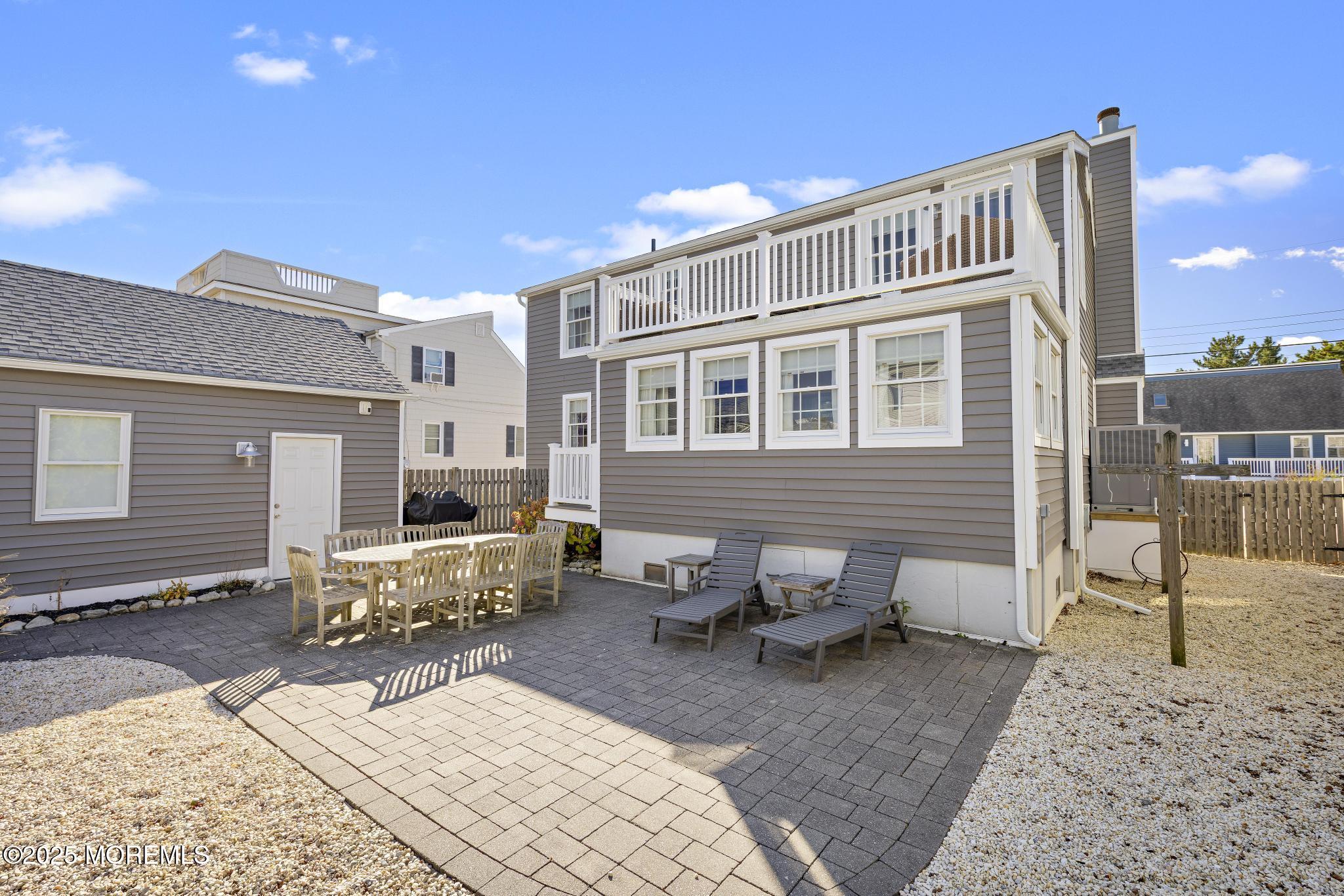 9 Inlet Road Beach Haven, NJ 08008 - Photo 32 of 51 a building outdoor space with patio furniture