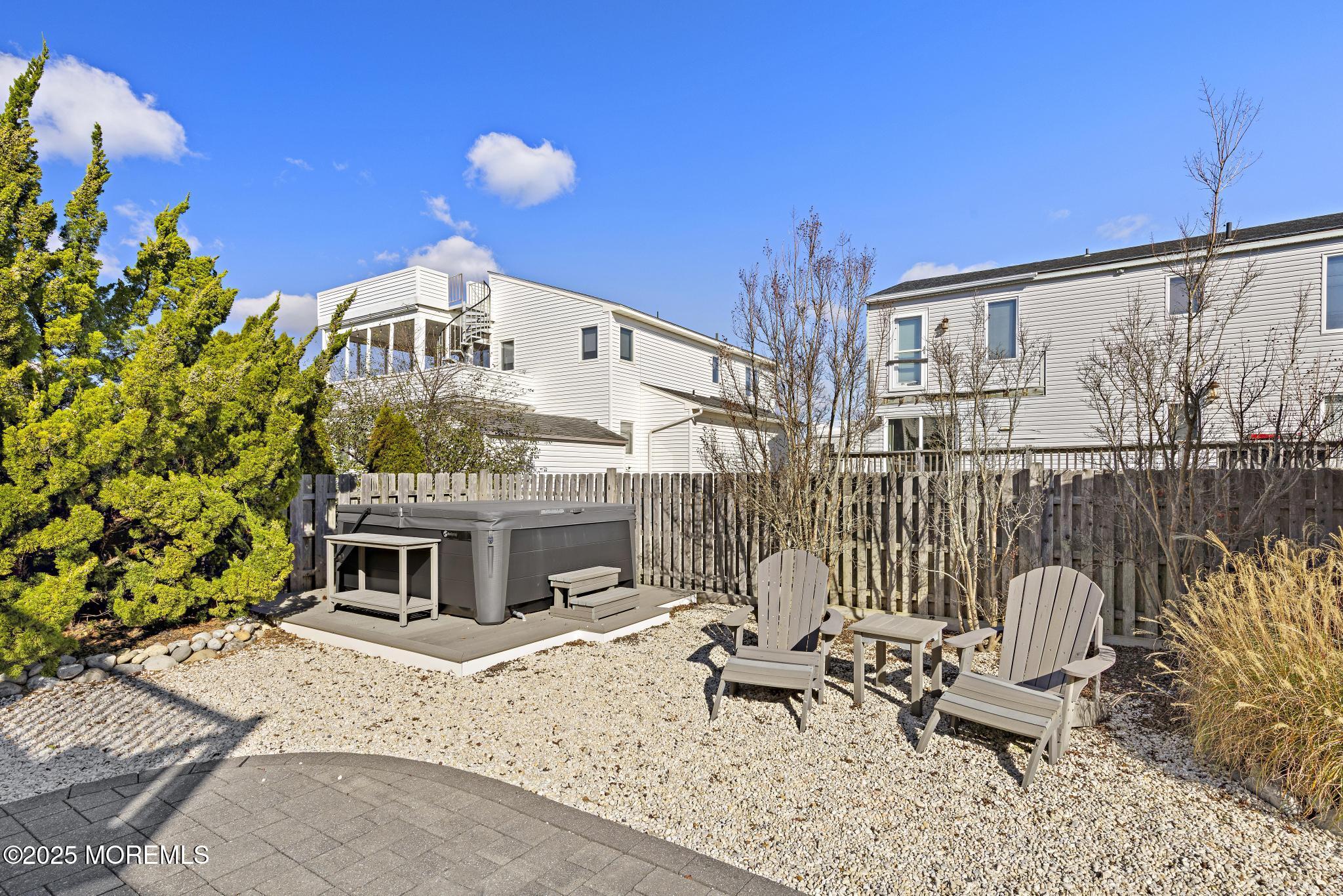 9 Inlet Road Beach Haven, NJ 08008 - Photo 33 of 51 a view of a chairs and table in the patio