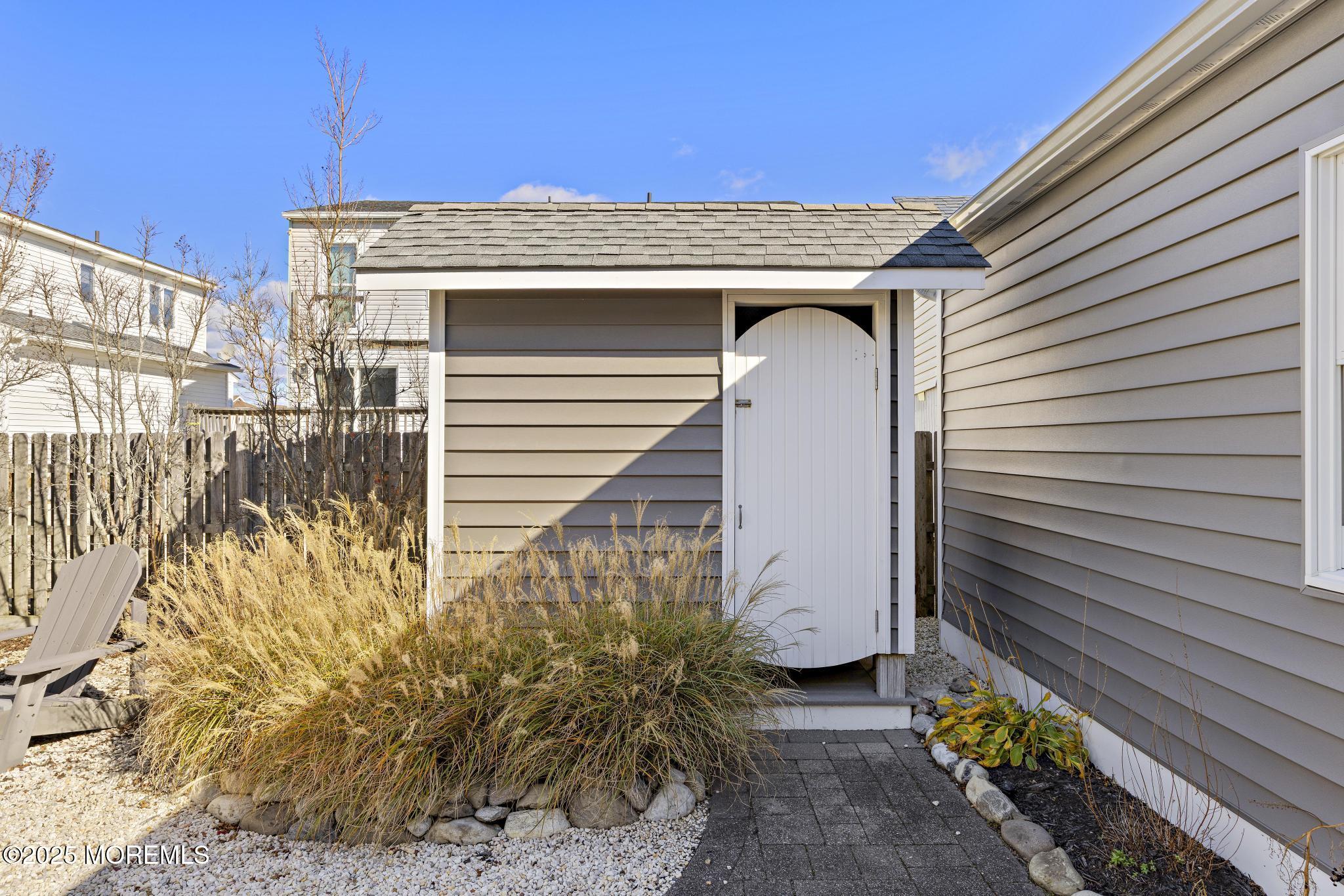 9 Inlet Road Beach Haven, NJ 08008 - Photo 34 of 51 a view of a house with a yard