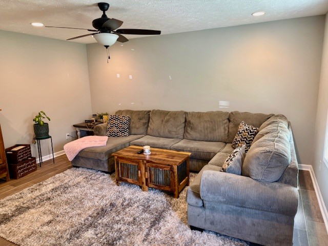 1316 Old Cowan Road Winchester, TN 37398 - Photo 2 of 23 a spacious bedroom with a bed a couch and a chandelier