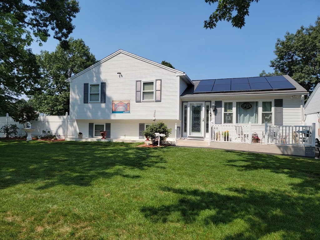 192 Starling Road Springfield, MA 01119 - Photo 1 of 26 a front view of a house with a garden and porch