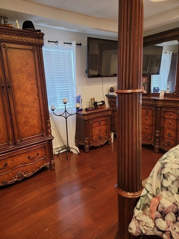 192 Starling Road Springfield, MA 01119 - Photo 20 of 26 a view of living room with furniture and a flat screen tv