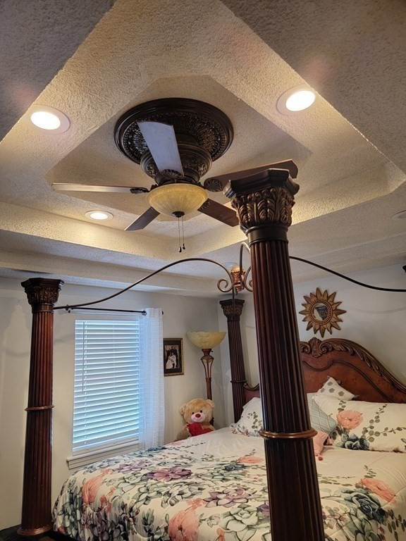 192 Starling Road Springfield, MA 01119 - Photo 21 of 26 a bedroom with a bed and a large mirror