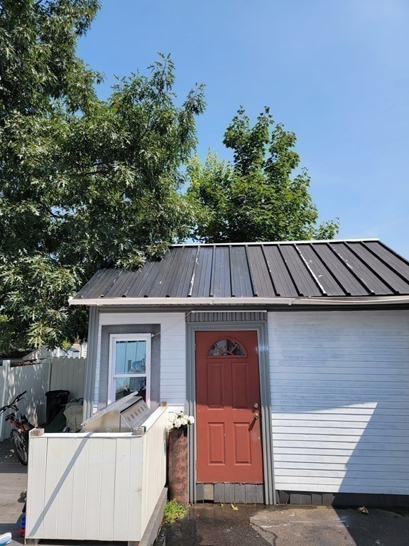 192 Starling Road Springfield, MA 01119 - Photo 23 of 26 a view of a house with a sink and a yard