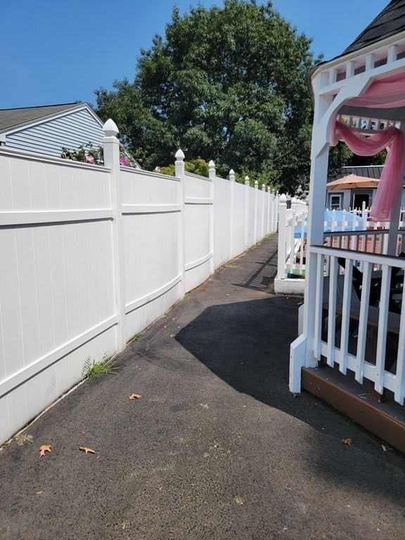 192 Starling Road Springfield, MA 01119 - Photo 25 of 26 a view of a street with wooden fence