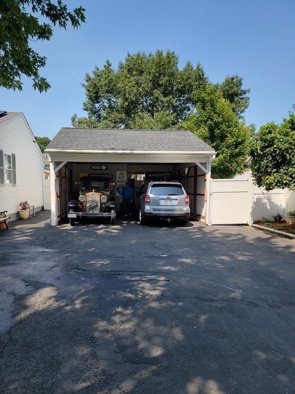 192 Starling Road Springfield, MA 01119 - Photo 6 of 26 a car parked on the side of the road