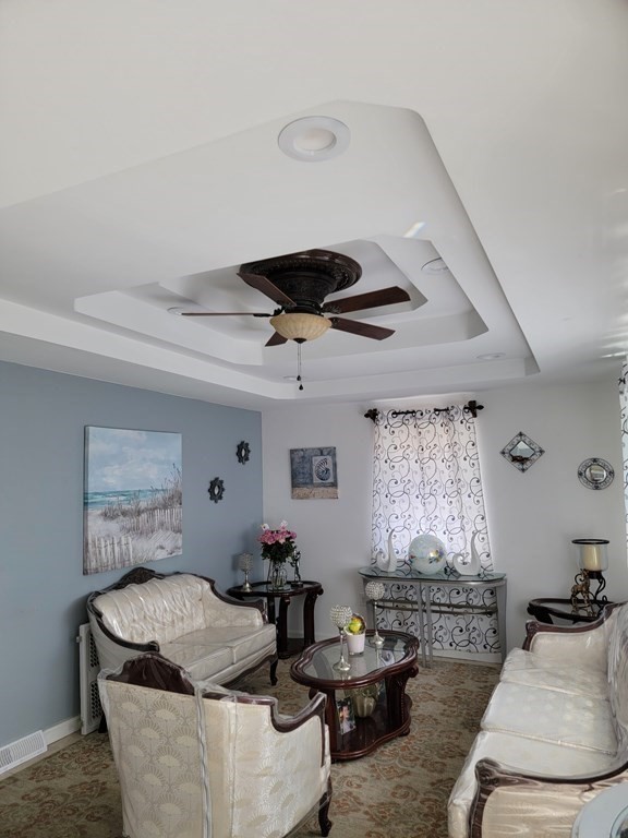 192 Starling Road Springfield, MA 01119 - Photo 9 of 26 a living room with furniture and window