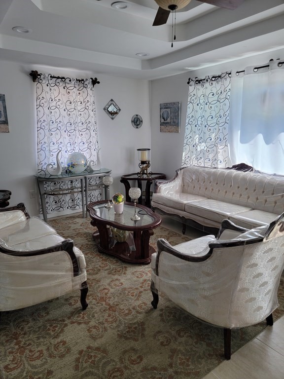 192 Starling Road Springfield, MA 01119 - Photo 10 of 26 a living room with furniture and a fireplace