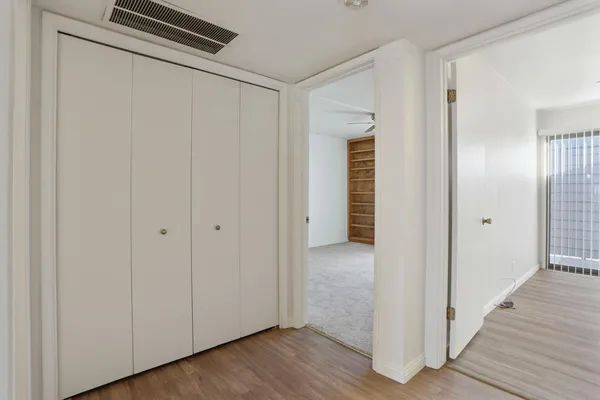 a view of a livingroom with wooden floor
