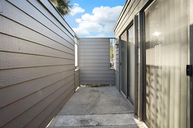 a view of back yard of a house
