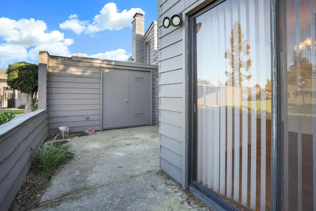a view of a back yard of the house