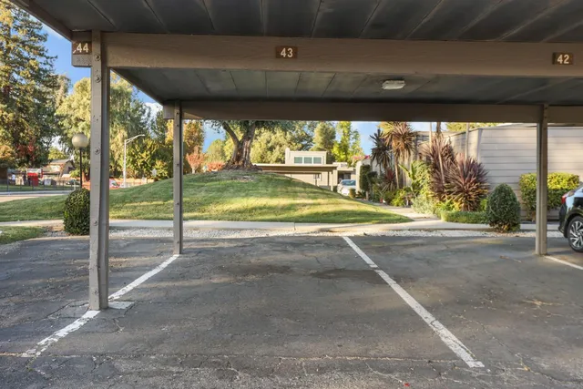 a view of a swimming pool with a lounge chairs