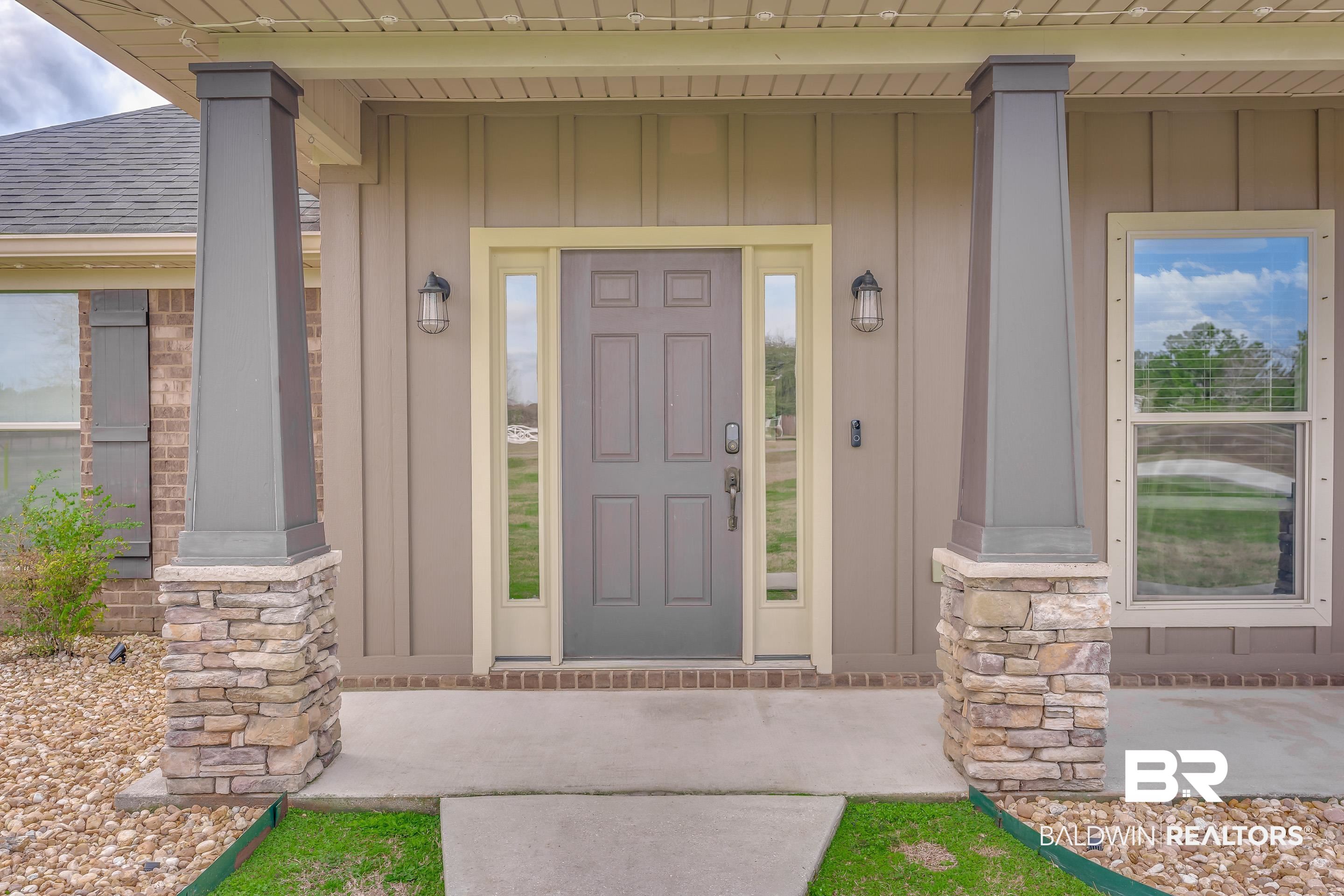 13235 Tom Gaston Road Mobile, AL 36695 - Photo 41 of 43 View of exterior entry with a porch