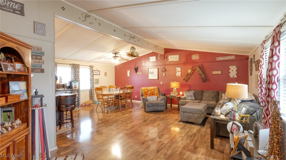 10614 Linwood Road Pleasant City, OH 43772 - Photo 2 of 48 Living area with laminate floors and ceiling fan