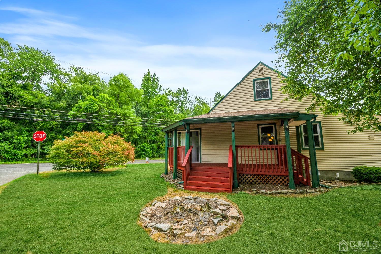1100 Junction Road Browns Mills, NJ 08015 - Photo 1 of 27 a front view of a house with garden