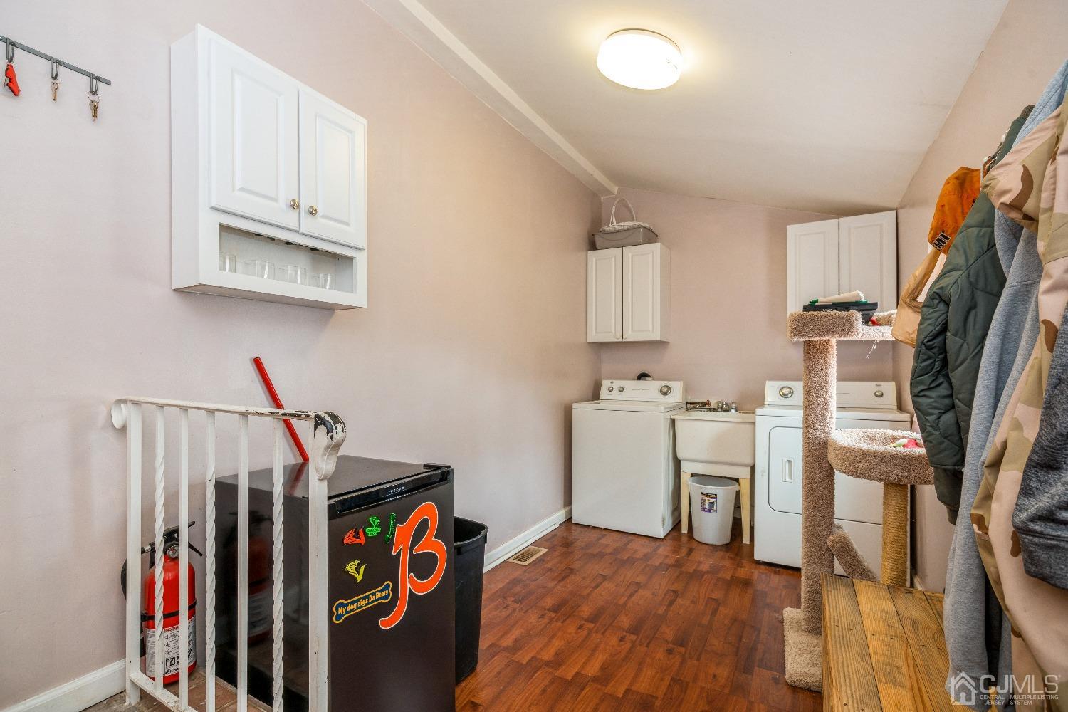 1100 Junction Road Browns Mills, NJ 08015 - Photo 4 of 27 a view of a kitchen with fridge and wooden floor