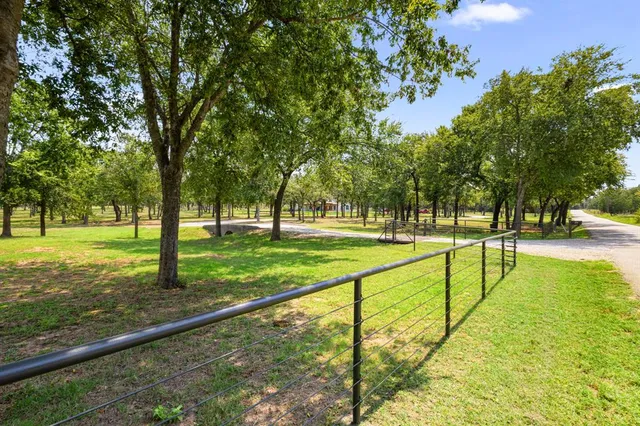 a view of swimming pool with an outdoor seating