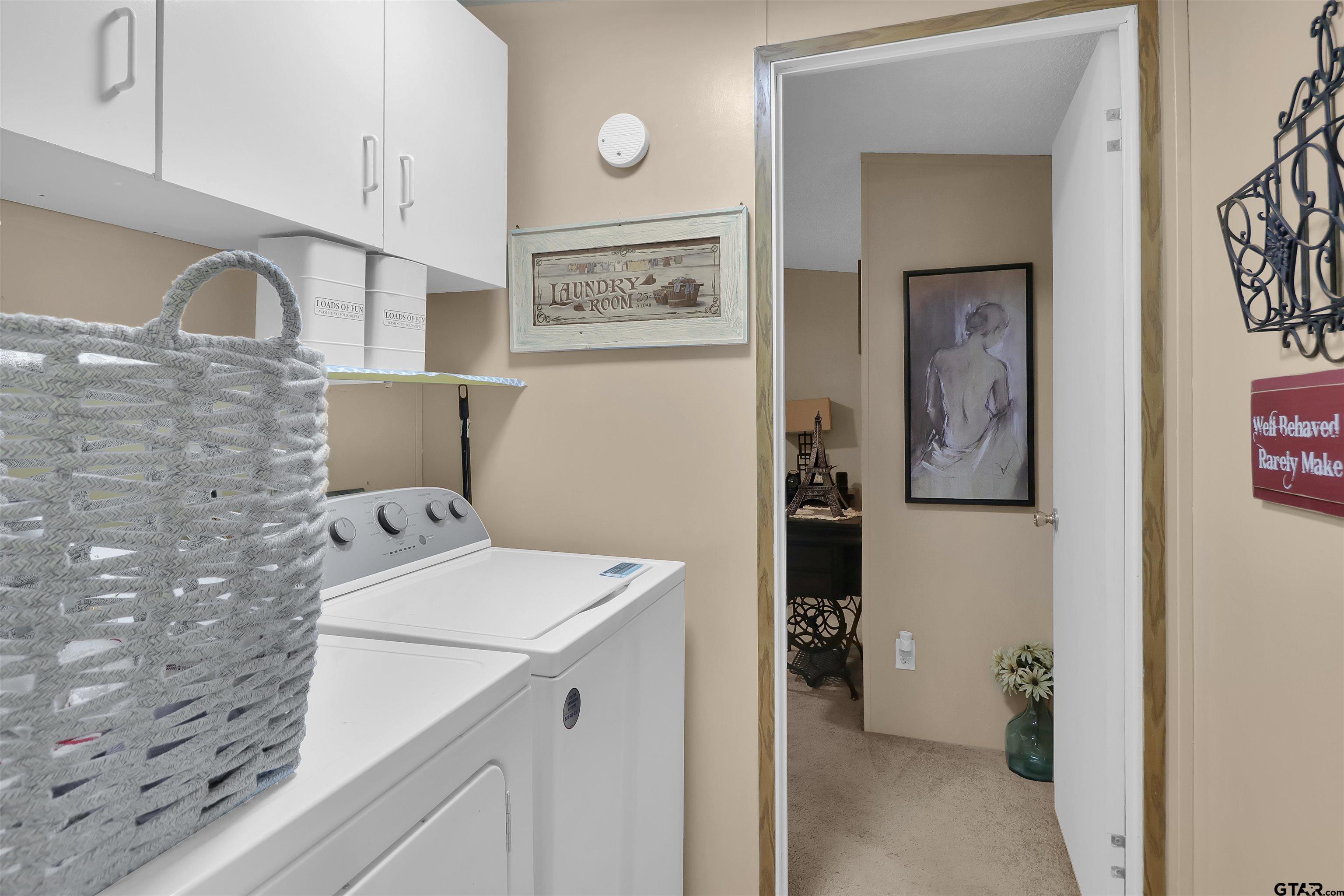 602 North Commerce Street Overton, TX 75684 - Photo 13 of 17 a utility room with dryer and washer