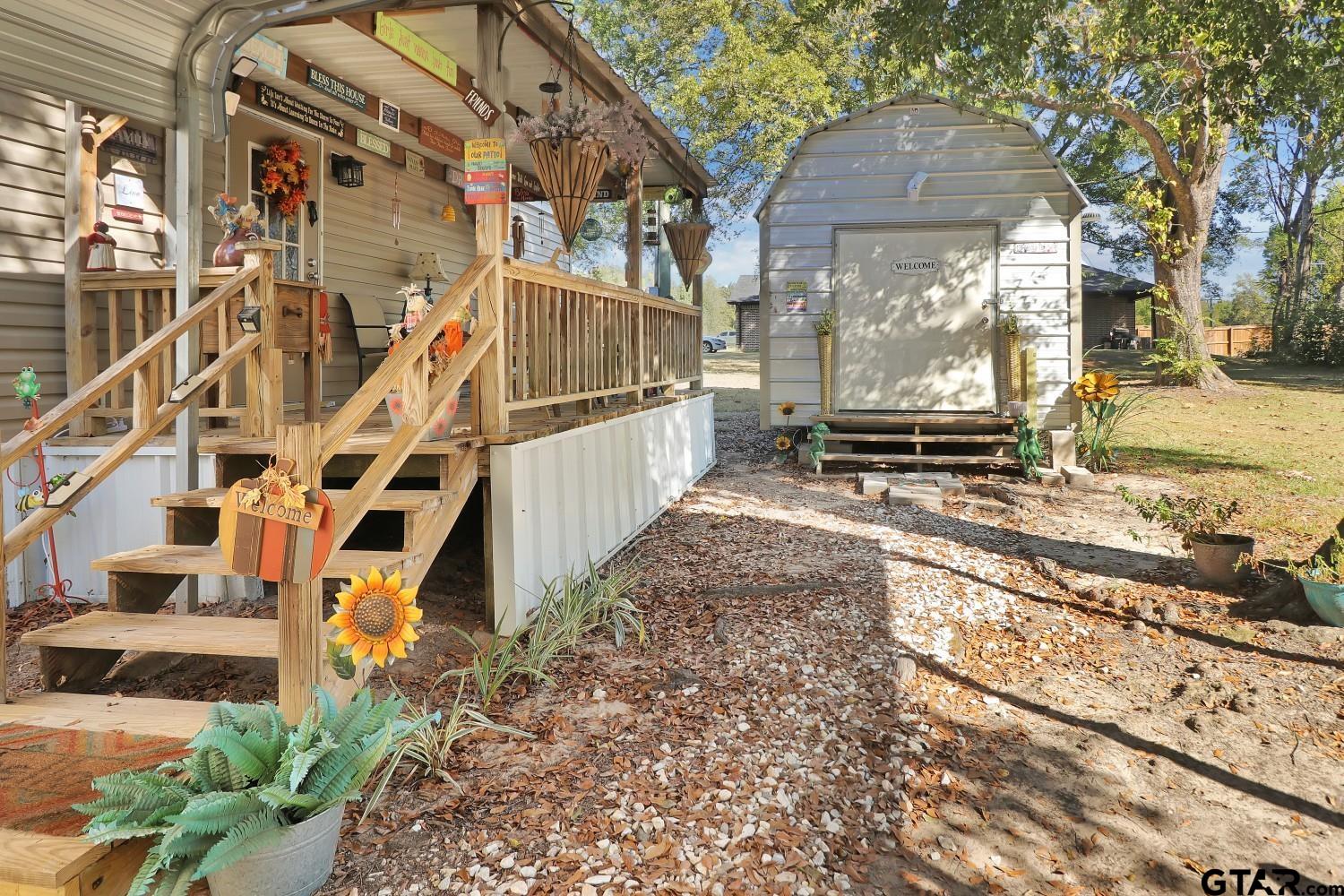 602 North Commerce Street Overton, TX 75684 - Photo 16 of 17 a view of a pathway with a house