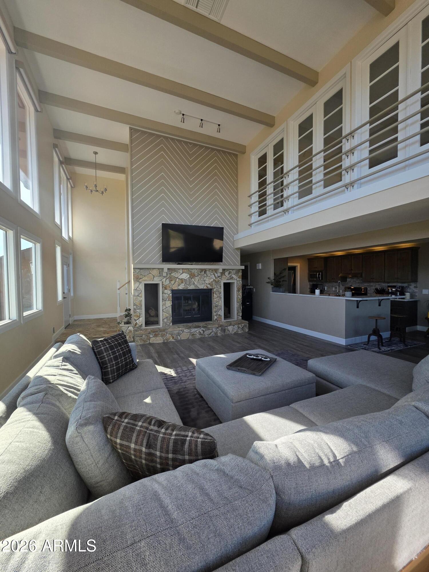4880 Comanche Trail Prescott, AZ 86301 - Photo 12 of 44 a living room with furniture and a fireplace