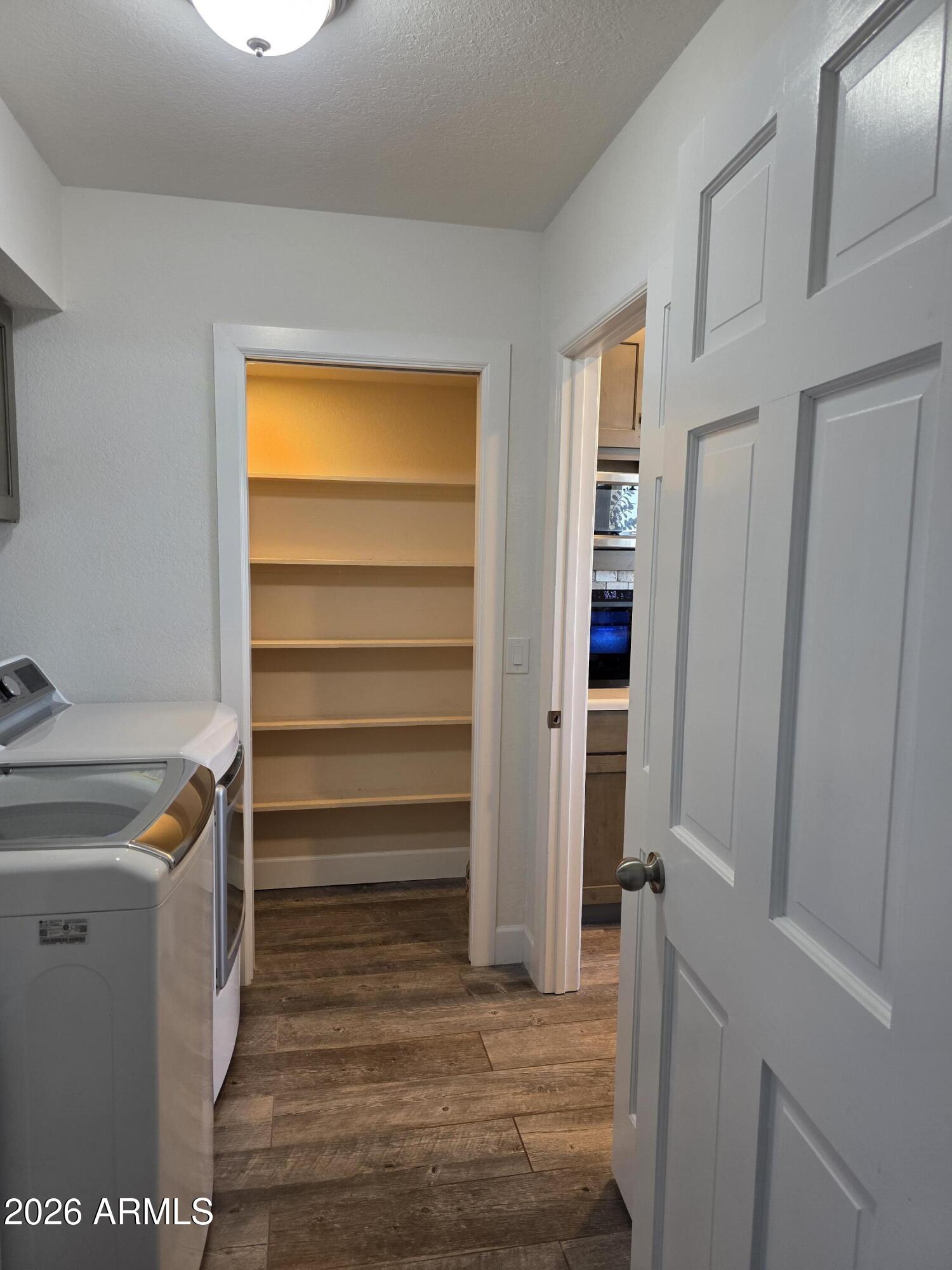 4880 Comanche Trail Prescott, AZ 86301 - Photo 17 of 44 a view of walk in closet with empty racks