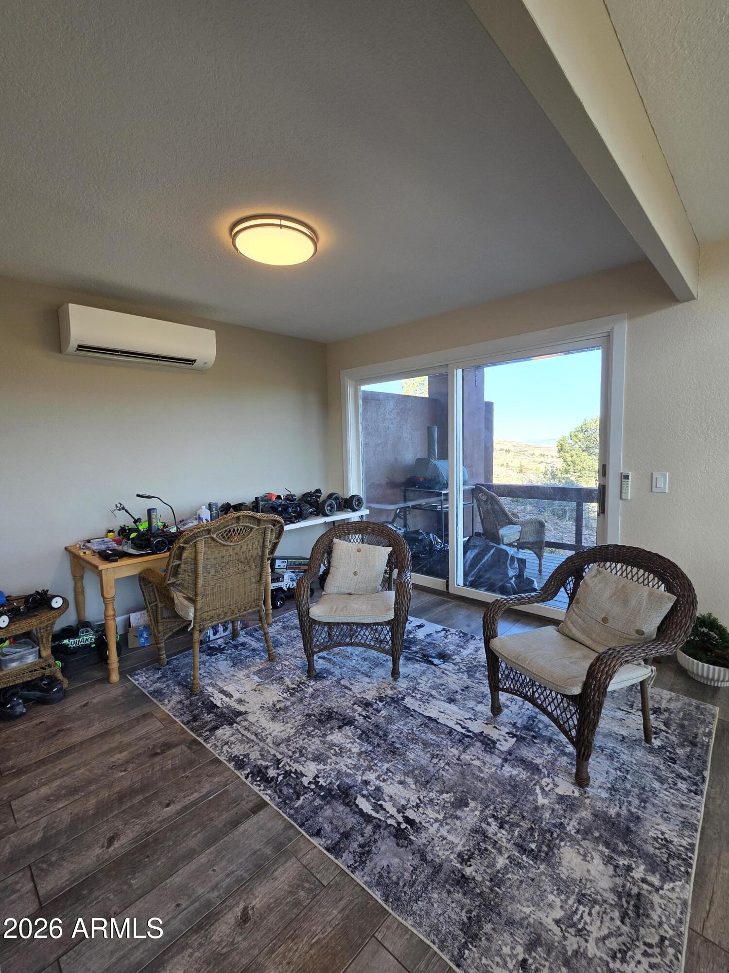 4880 Comanche Trail Prescott, AZ 86301 - Photo 20 of 44 a living room with furniture and a rug