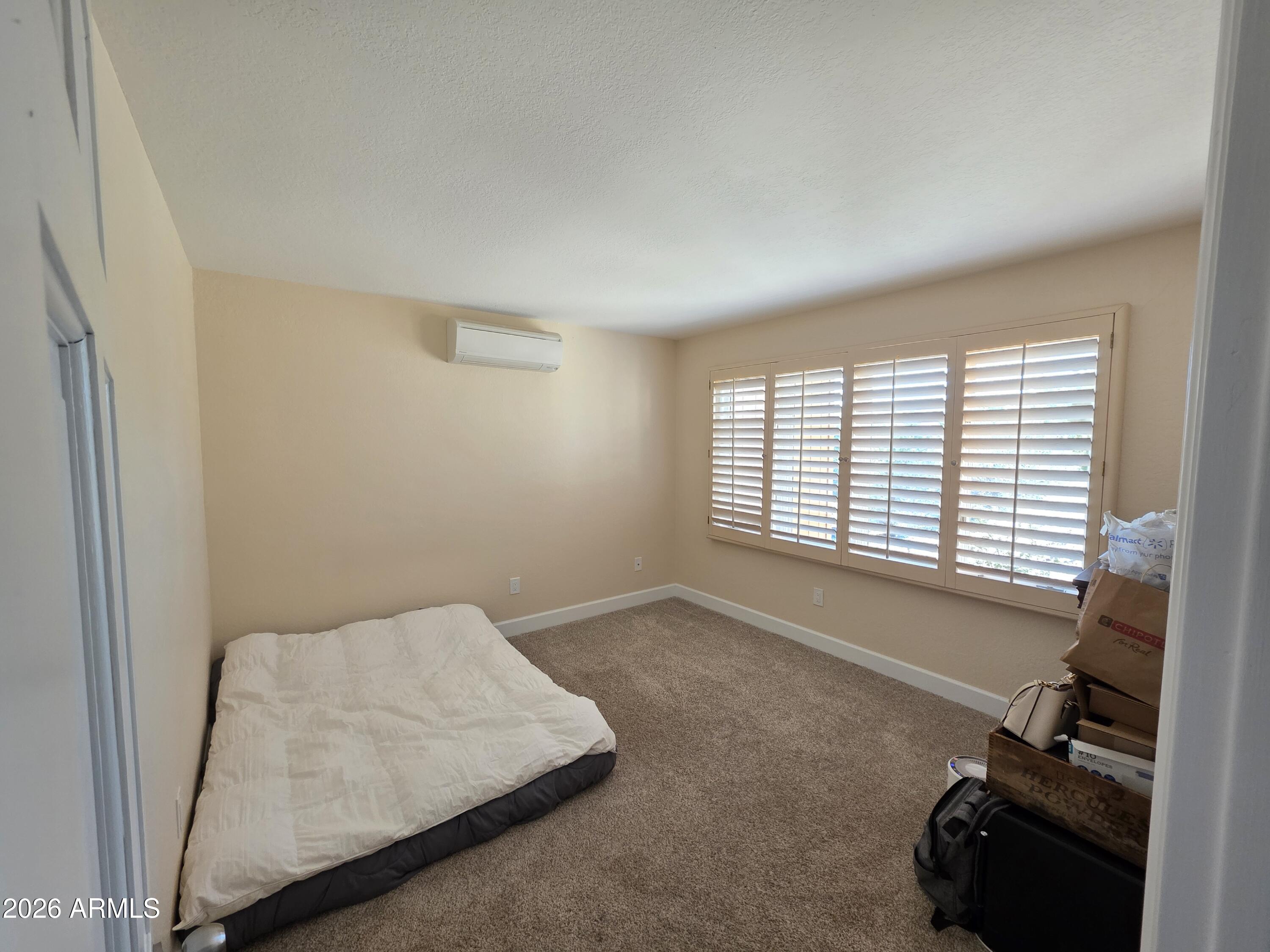 4880 Comanche Trail Prescott, AZ 86301 - Photo 24 of 44 a room with furniture and a window