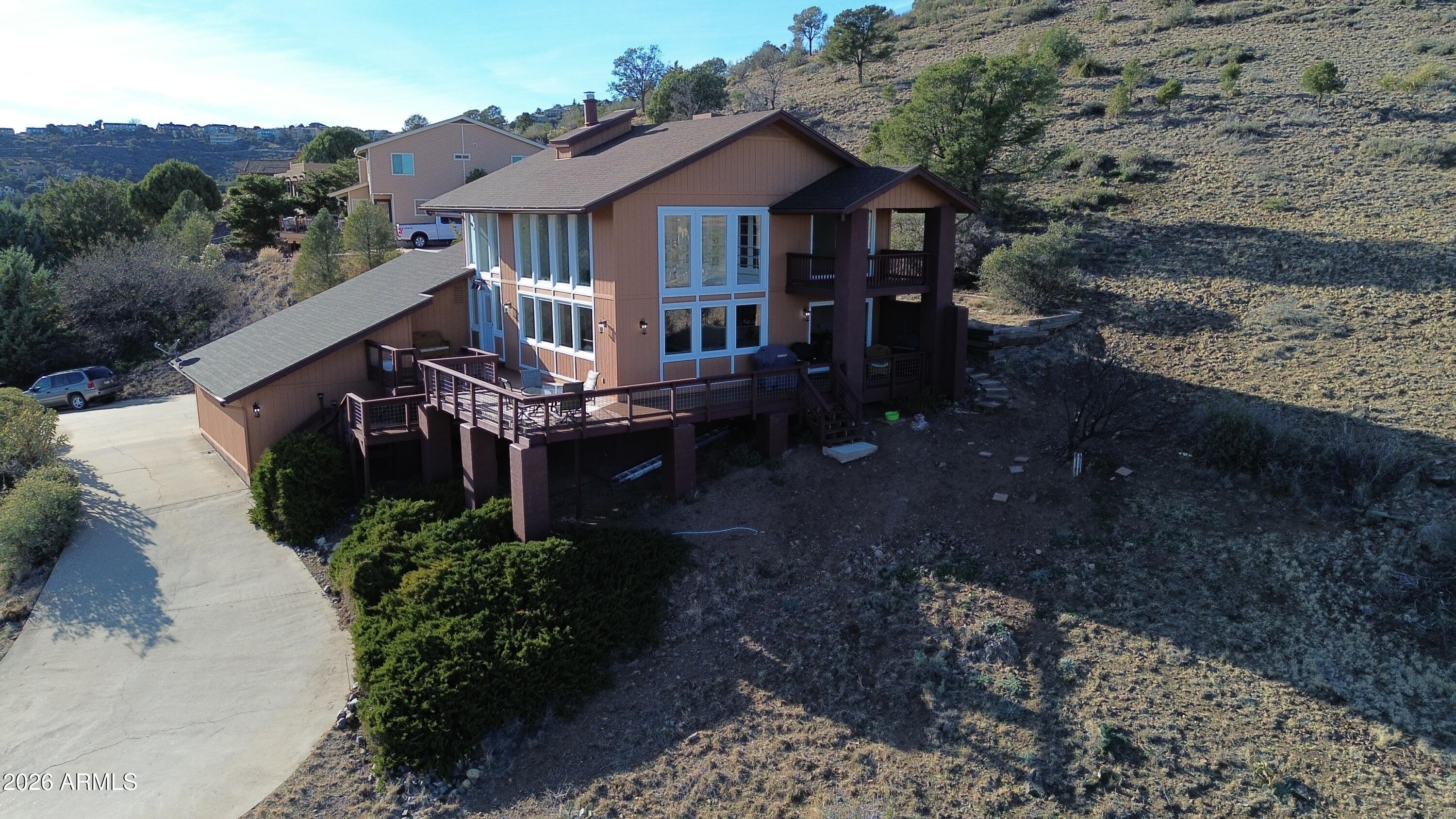 4880 Comanche Trail Prescott, AZ 86301 - Photo 7 of 44 a front view of a house with a yard