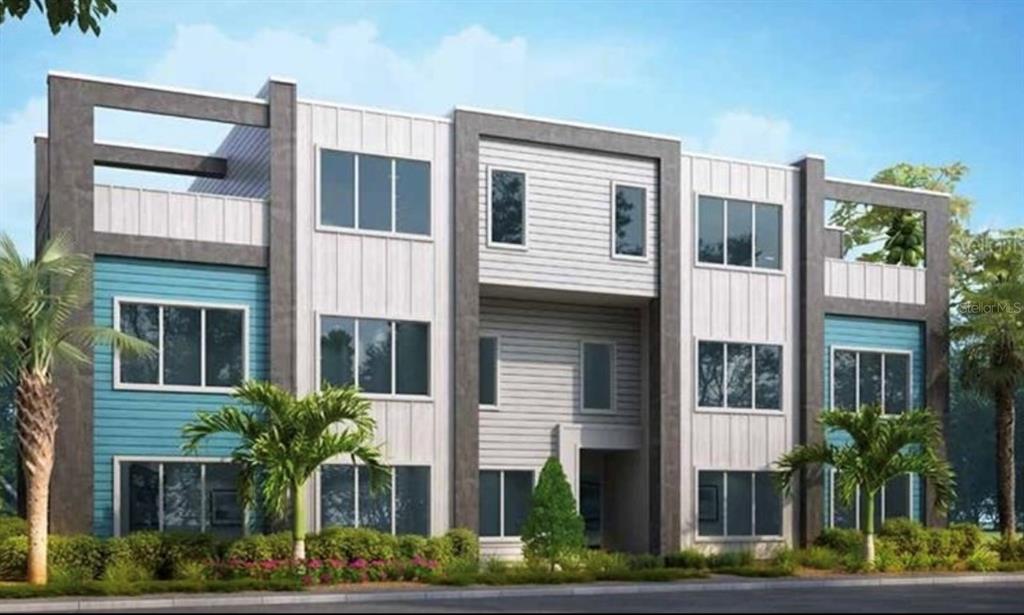 7760 Sandy Ridge Drive, Unit 108 Reunion, FL 34747 - Photo 13 of 16 a front view of a house with a garden
