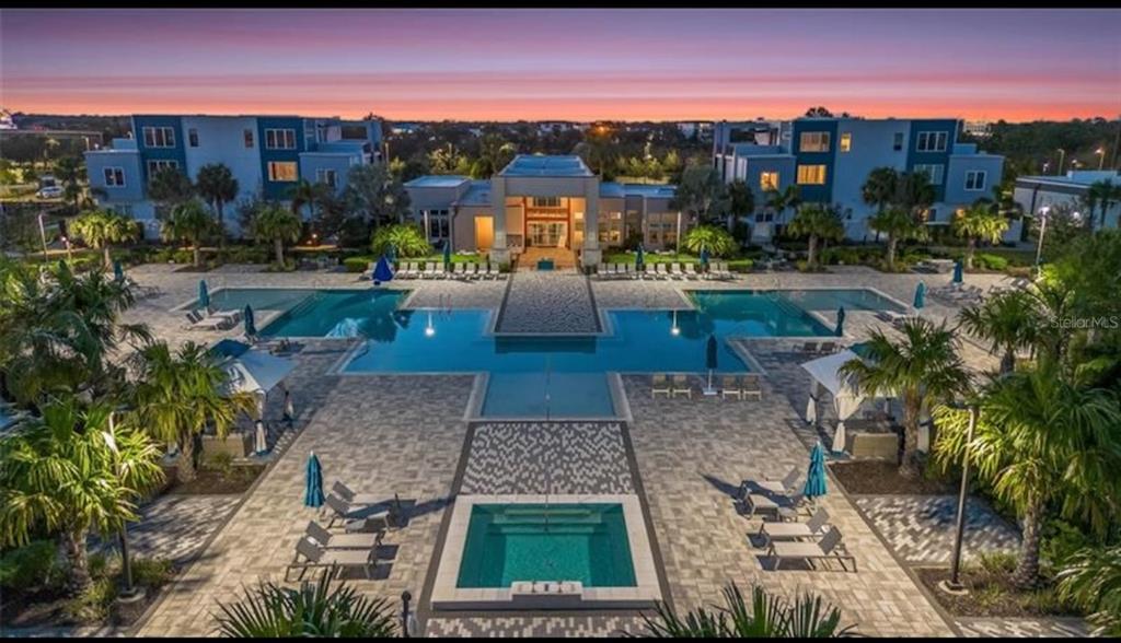 7760 Sandy Ridge Drive, Unit 108 Reunion, FL 34747 - Photo 16 of 16 a view of a city with lots of palm trees