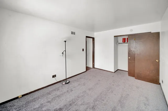 a view of a room with an empty space