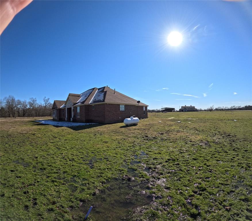 6401 County Road 3208 Lone Oak, TX 75453 - Photo 2 of 26 a house view with a garden