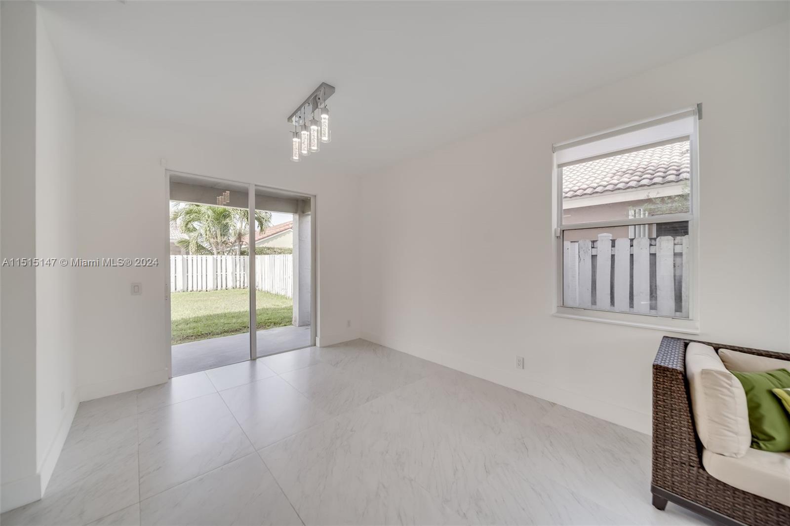 958 Briar Ridge Road Weston, FL 33327 - Photo 15 of 55 an empty room with windows