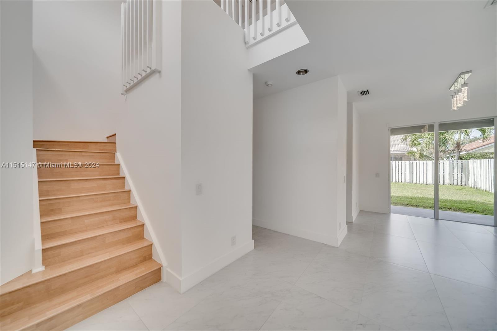 958 Briar Ridge Road Weston, FL 33327 - Photo 22 of 55 a view of an entryway with stairs