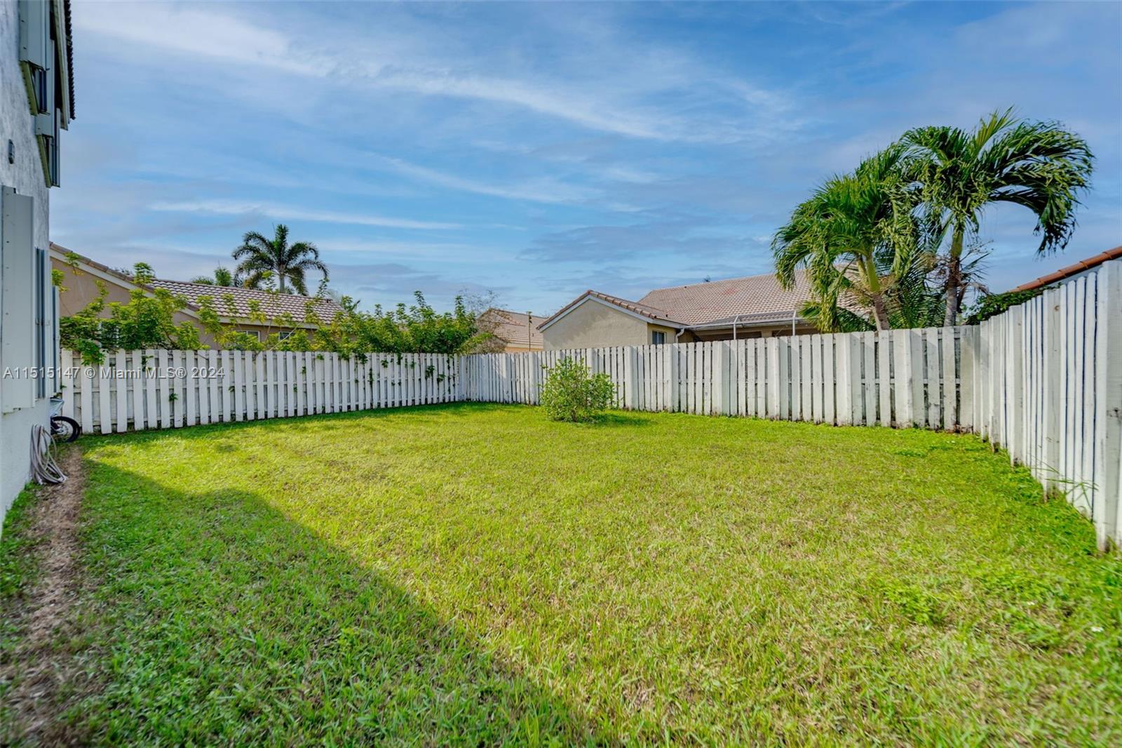 958 Briar Ridge Road Weston, FL 33327 - Photo 48 of 55 a view of outdoor space and yard