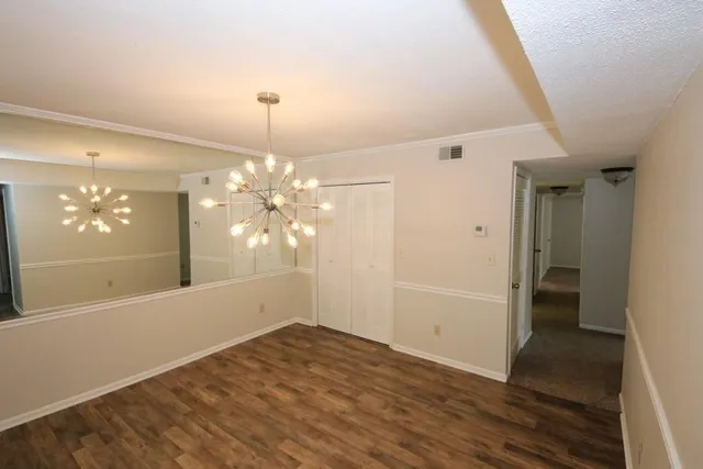 a view of a livingroom with a chandelier