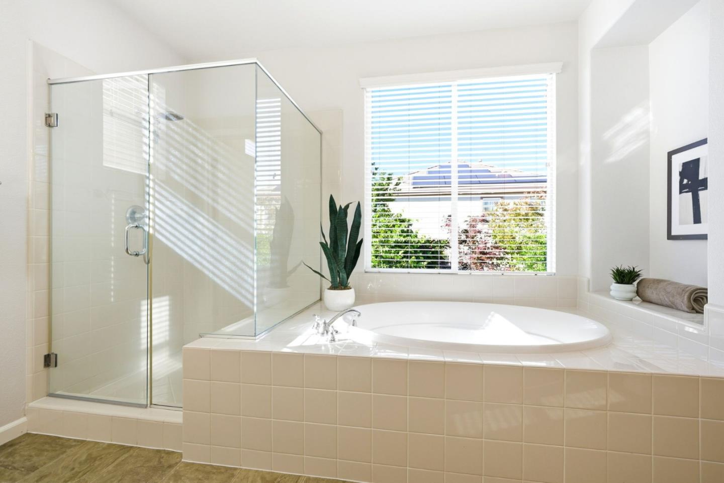 2556 Harlow Lane San Ramon, CA 94582 - Photo 33 of 62 a white bath tub sitting in a bathroom next to a window