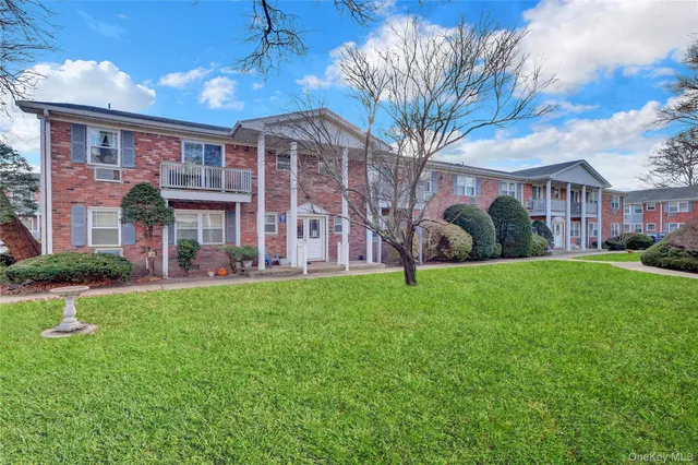 a house view with a garden space